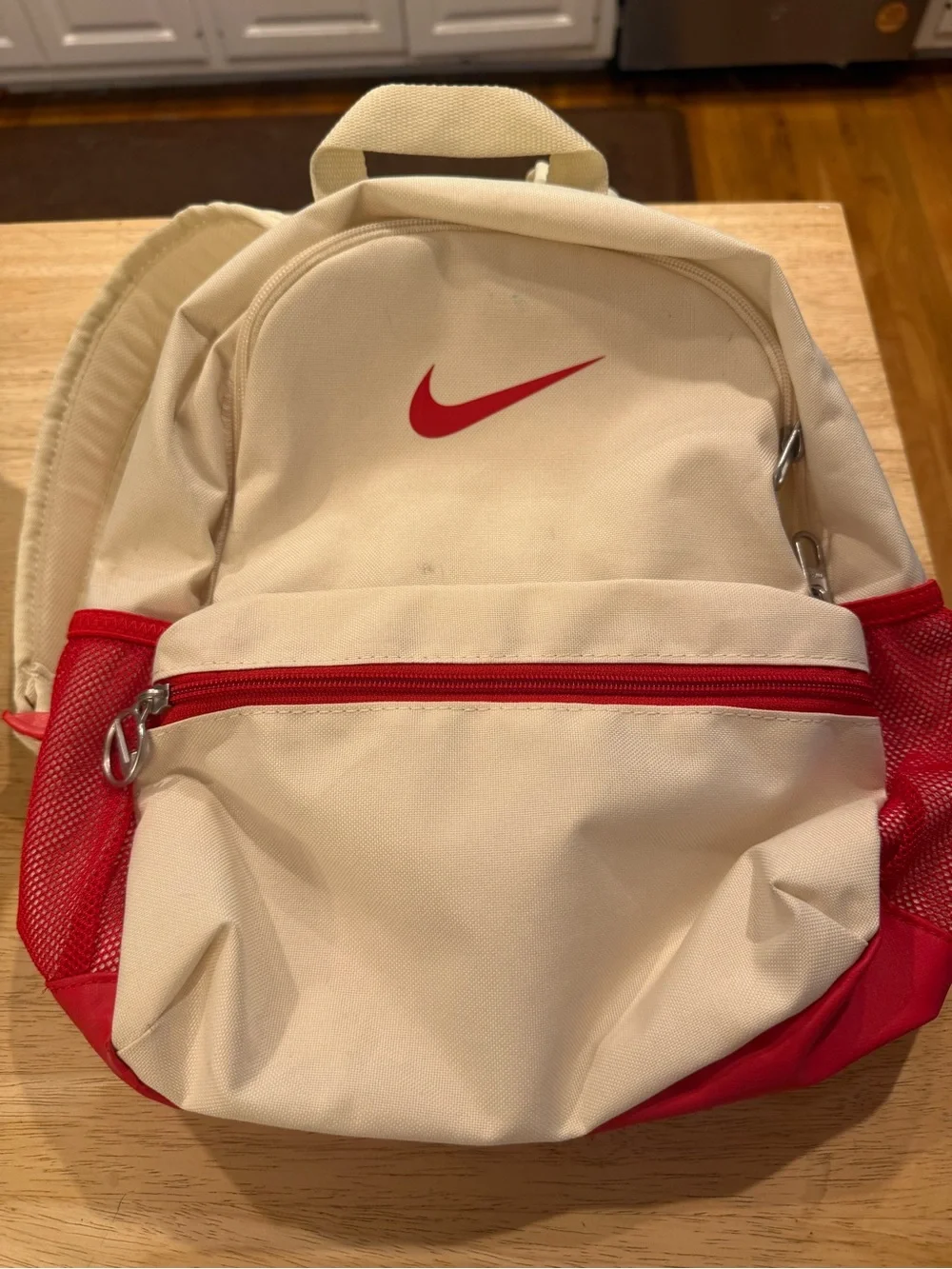 Nike Cream and Red Mini Backpack with Swoosh